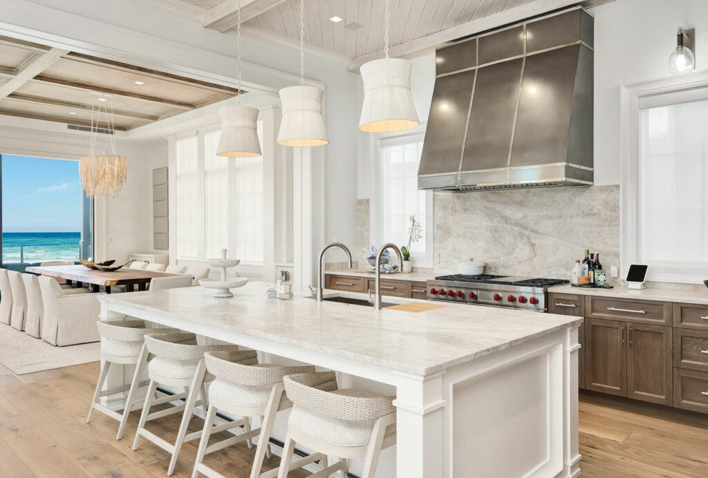 Luxury oceanfront interior design kitchen and dining room in Destin, FL by Interior Designer Marsha Faulkner