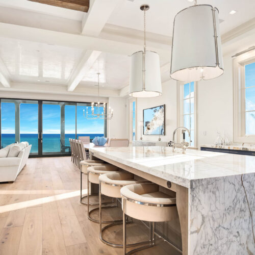 This luxury oceanfront home in Destin, FL, is a masterpiece of modern Destin interior design. Marsha Faulkner's attention to detail and her passion for creating timeless interiors is evident in every aspect of the space. From the grand living room to the intimate bedrooms, this home is a perfect oasis for relaxation and rejuvenation.
